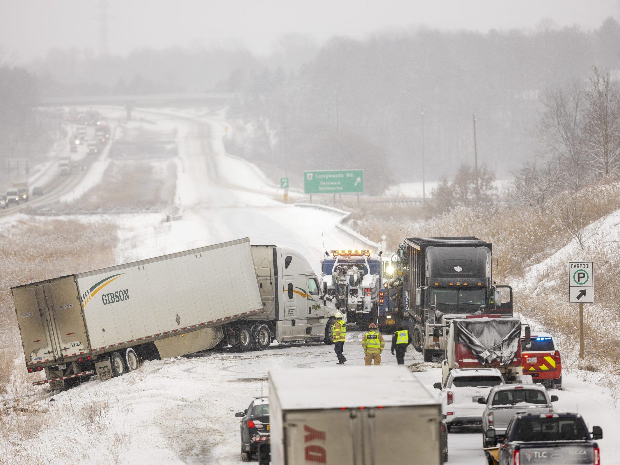 Large Crash Snarls Hwy. 402, Police Urge Caution Amid Snow: 'Slow Down ...