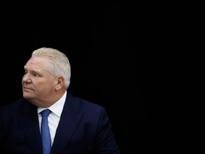 Ontario Premier Doug Ford looks on during an announcement, in Toronto, Wednesday, Jan. 17, 2024.