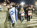 About 100 people, mostly Western University students, protest outside of the school’s North Campus Building where Sami Hamdi was speaking as part of the Canadian Muslim Public Affairs Council’s advocacy tour for Palestinian solidarity in London on Thursday, Feb. 8, 2024. (Derek Ruttan/The London Free Press)