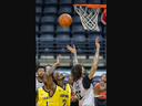 Jachai Taylor of the London Lightning and Tyler Groce of the Windsor Express reach for a rebound during their Basketball Super League game at Budweiser Gardens in London on Tuesday February 27, 2024. Derek Ruttan/The London Free Press/Postmedia Network