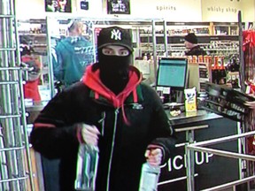 Sarnia police released this photo of a suspect they wanted help in identifying in December after a Salvation Army volunteer was hurt trying to stop a liquor store theft. (Sarnia police)