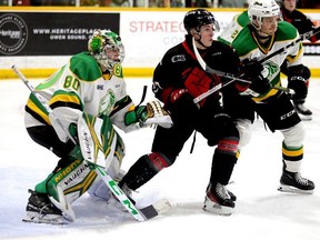 From left to right, Owen Willmore, Antonio Tersigni and Alec Leonard prepare for a shot from the point in the first period as the Owen Sound Attack host the London Knights inside the Harry Lumley Bayshore Community Centre on Saturday, Feb. 3, 2024. Greg Cowan/The Sun Times