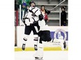 Chatham Maroons player Jacob Cloutier celebrates with goalie Tommy O'Donnell after scoring in the third overtime against the LaSalle Vipers in Game 2 in their GOJHL Western Conference quarter-final at Chatham Memorial Arena on Sunday March 10, 2024. (Mark Malone/Postmedia Network)