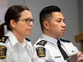 London police deputy chief Trish McIntyre  and Chief Thai Truong listen to questions at a police services board public meeting in London on Thursday, March 21, 2024. 
(Mike Hensen/The London Free Press)