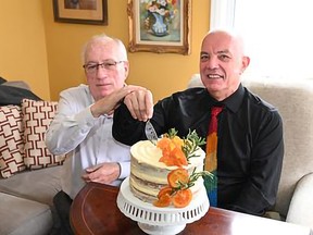 two men, cake