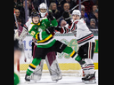 Max McCue of the London Knights tangles with Michael Buchinger in front of goalie Damian Slavik of the Guelph Storm during their Ontario Hockey League game at Budweiser Gardens in London on Sunday March 24, 2024. Derek Ruttan/The London Free Press