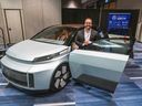 Flavio Volpe, head of the Auto Parts Manufacturers' Association, shows the Project Arrow concept car at RBC Place in London on Monday, April 8, 2024. (Derek Ruttan/The London Free Press)