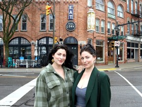Twin sisters, Karissa, left, and Kat Strain are shown in their hometown of Chatham. (Ellwood Shreve/Chatham Daily News)
