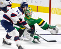 London Knights goalie Michael Simpson stops a backhand shot from Matyas Sapovaliv of the Saginaw Spirit in the second period of Game 2 of the OHL Western Conference final at Budweiser Gardens in London on Sunday, April 28, 2024.  (Derek Ruttan/The London Free Press)