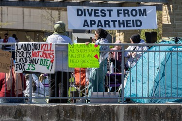 Pro-Palestinian protesters occupy the lawn outside the University community centre at Western University in London, Ont., on Wednesday, May 1, 2024. (Derek Ruttan/The London Free Press)