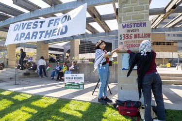 Pro-Palestinian protesters occupy the lawn outside the University community centre at Western University in London, Ont., on Wednesday, May 1, 2024. (Derek Ruttan/The London Free Press)