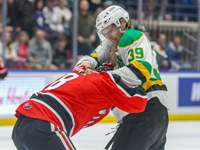 London Knights player Max McCue fights Kalem Parker of the Moose Jaw Warriors