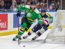 London Knights defenceman Sam Dickinson carries the puck with Strathroy native Hunter Haight of the Saginaw Spirit in pursuit during their Memorial Cup game in Saginaw, Mich. on May 29, 2024. Eric Young/CHL