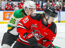 Denver Barkey of the London Knights and Peter Repcik of the Drummondville Voltigeurs are shown during their Memorial Cup game in Saginaw, Michigan on May 25, 2024. (X.com/CHL)