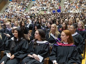 Students in the last class to graduate from Brescia University College sit in rows at a convocation ceremony at Alumni Hall at Western University in London on Monday, June 17, 2024. (Derek Ruttan/London Free Press)