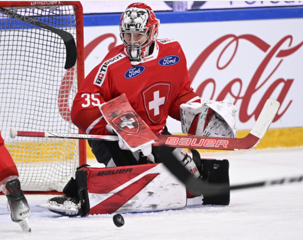 London goalie Connor Hughes makes a save while playing for Switzerland in a game against the Czech Republic on Feb. 11, 2024. (Getty Images)