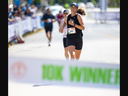 Lydia Beaudette of Beamsville approaches the finish line on Dufferin Avenue in downtown London to win the women’s 10-kilometre race at the Forest City Road Races on Sunday June 9, 2024. Mike Hensen/The London Free Press