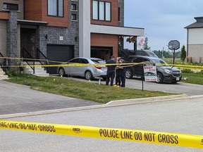 Stratford police talk outside a home on Bradshaw Drive