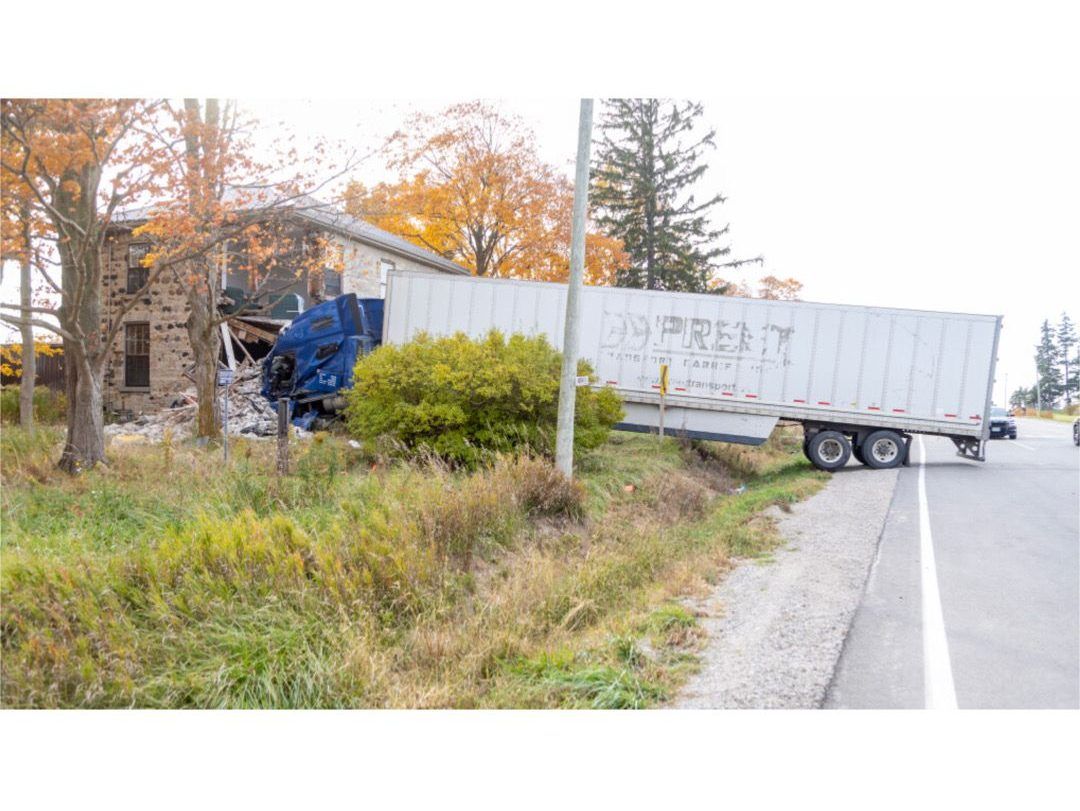 The intersection of Westchester Bourne and Bradley Avenue was closed after a transport truck crashed into a house just outside London on Wednesday October 23, 2024. Derek Ruttan/The London Free Press