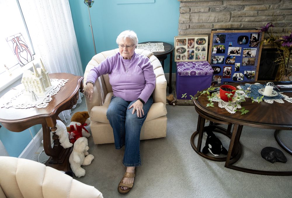Sitting in her London home close to photos of her son who was fatally shot in 2012, Jean Zak is dealing with another blow: the possibility she may have lost a six-figure investment with Robert (Randy) Hawken, her former financial adviser. (Derek Ruttan/The London Free Press)