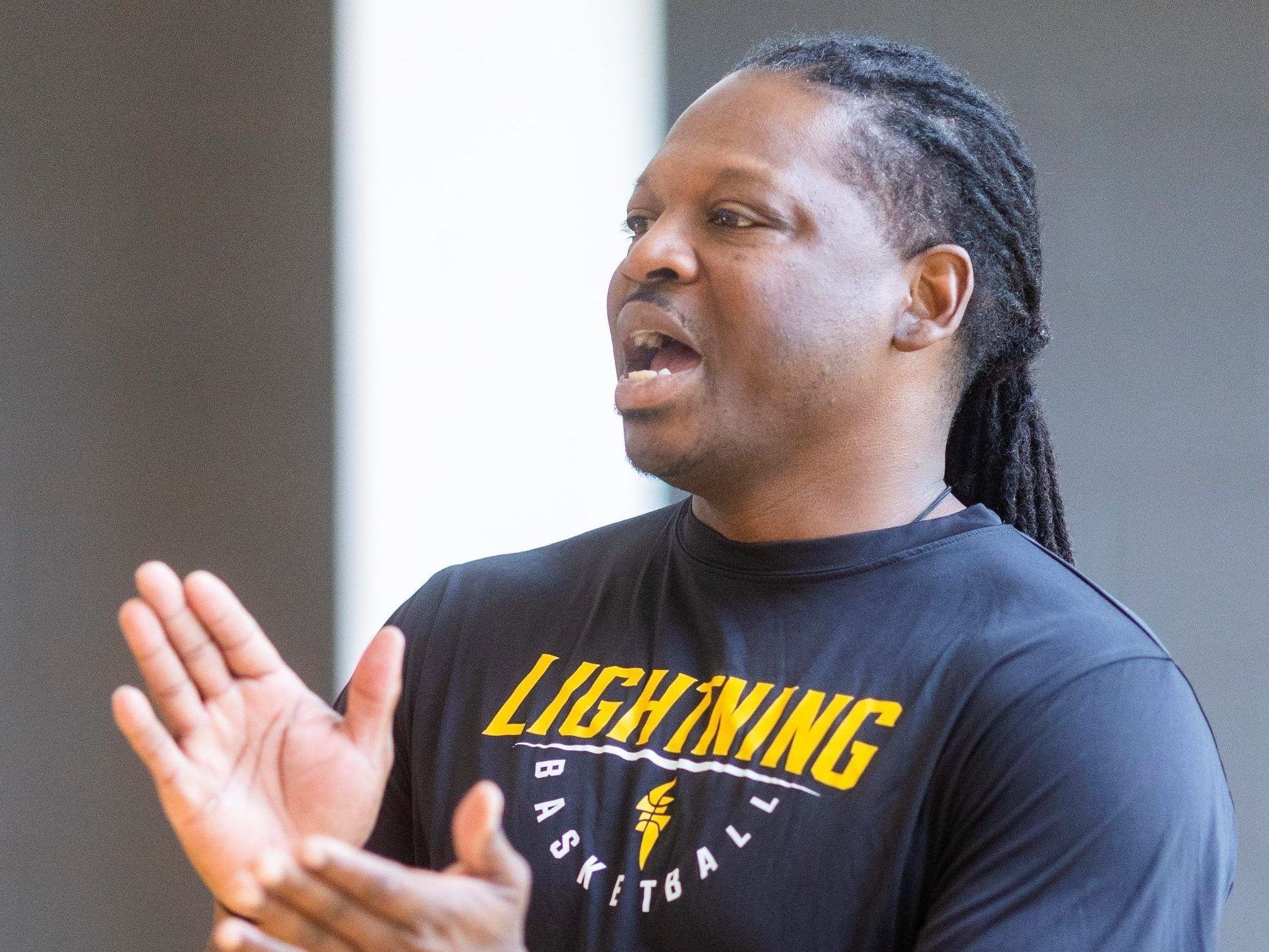 New London Lightning coach Jerry Williams applauds players as they practise at the Bostwick YMCA in London on Wednesday, Nov. 20, 2024. (Mike Hensen/The London Free Press)