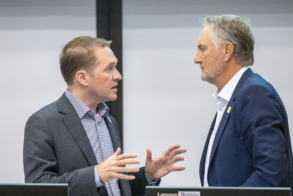 Mayor Josh Morgan, left, speaks to Ward 8 Coun. Steve Lehman during a 2025 city budget meeting at city hall in London on Thursday, Nov. 21, 2024. (Derek Ruttan/The London Free Press)