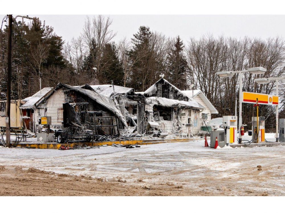 Investigators with the Ontario Fire Marshal’s Office probe an overnight fire at a gas station on Highway 24 at Forestry Farm Road near St. Williams, southwest of Simcoe, in Norfolk County on Jan. 22, 2025. (Brian Thompson/Postmedia Network)