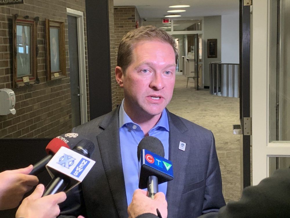 Mayor Josh Morgan speaks to reporters after meeting with London business and economic leaders about threatened U.S. tariffs. Photo taken on Feb. 7, 2025. (Jack Moulton/The London Free Press)