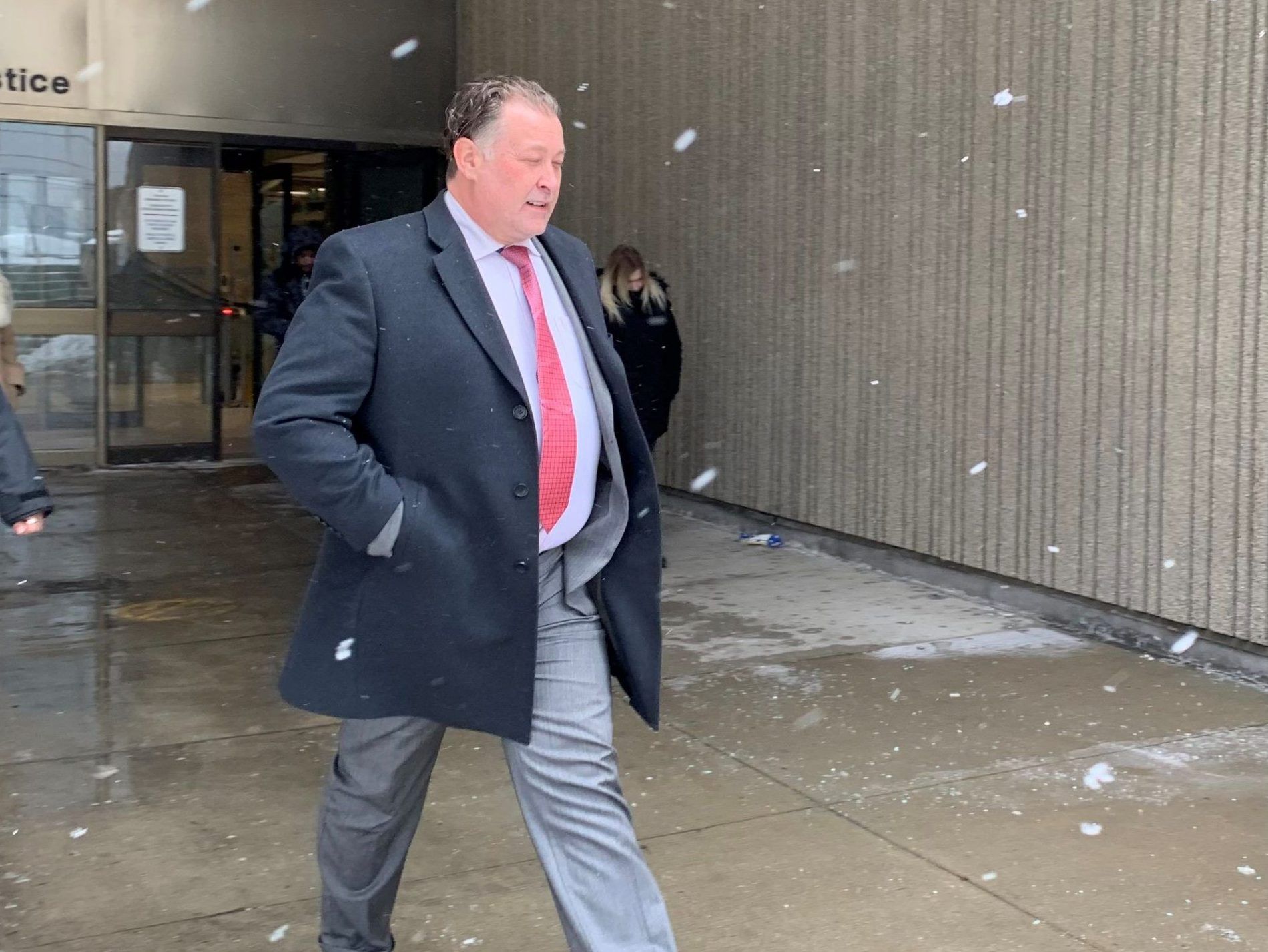 Former Woodstock mayor Trevor Birtch leaves the London courthouse after he pleaded not guilty to two counts of assault and one count of refusing to leave a premises in a trial on Thursday, Feb. 21, 2025. (Jane Sims/The London Free Press)