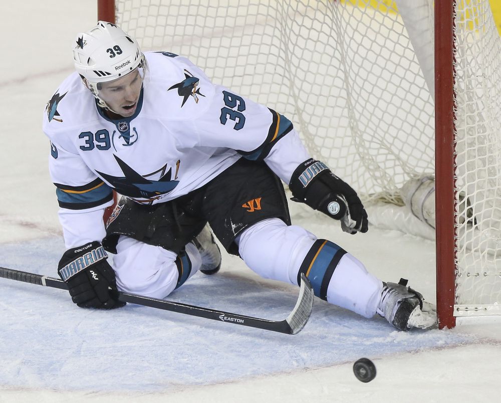 San Jose Sharks' Logan Couture plays net