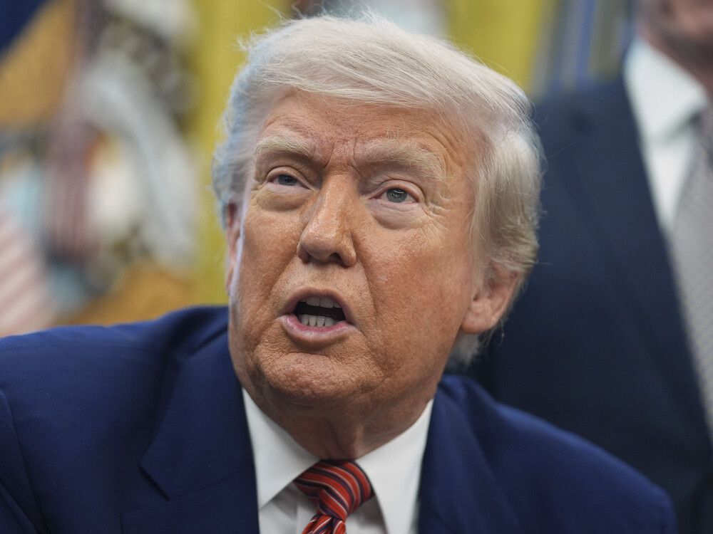 President Donald Trump speaks to reporters in the Oval Office of the White House, Friday, May 23, 2025, in Washington. (AP Photo/Evan Vucci, File)