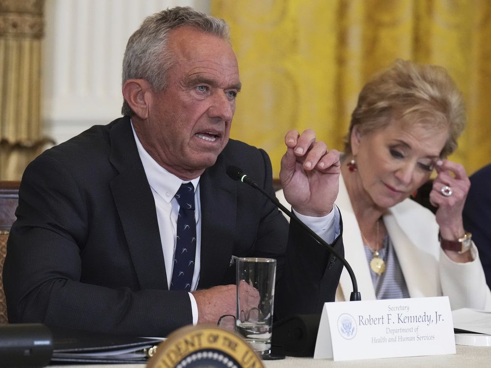 Health and Human Services Secretary Robert F. Kennedy Jr. speaks as Education Secretary Linda McMahon listens during a Make America Healthy Again (MAHA) commission event in the East Room of the White House, Thursday, May 22, 2025, in Washington. (AP Photo/Jacquelyn Martin)