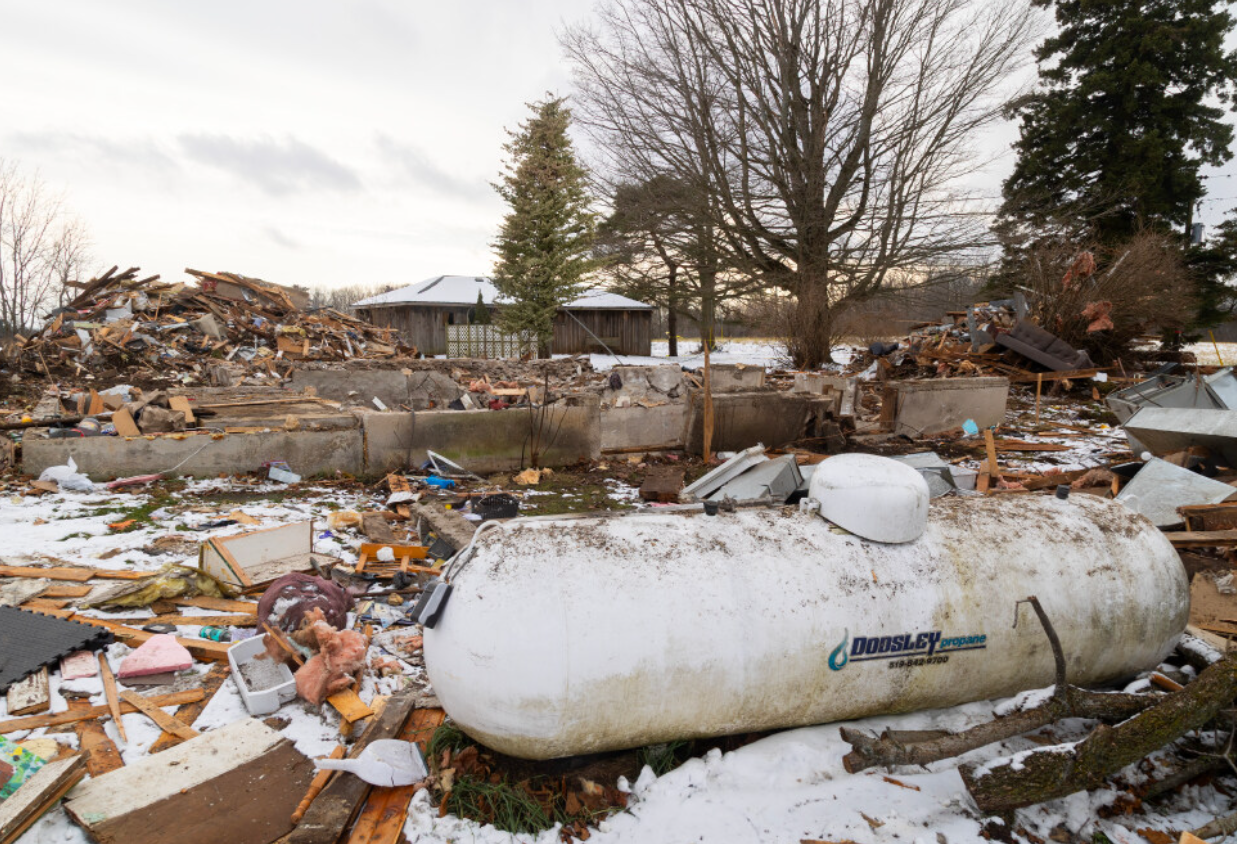  Debris is left behind two days after a house exploded on Sandytown Road near Straffordville in the Municipality of Bayham. Photo taken on Dec. 7, 2025.