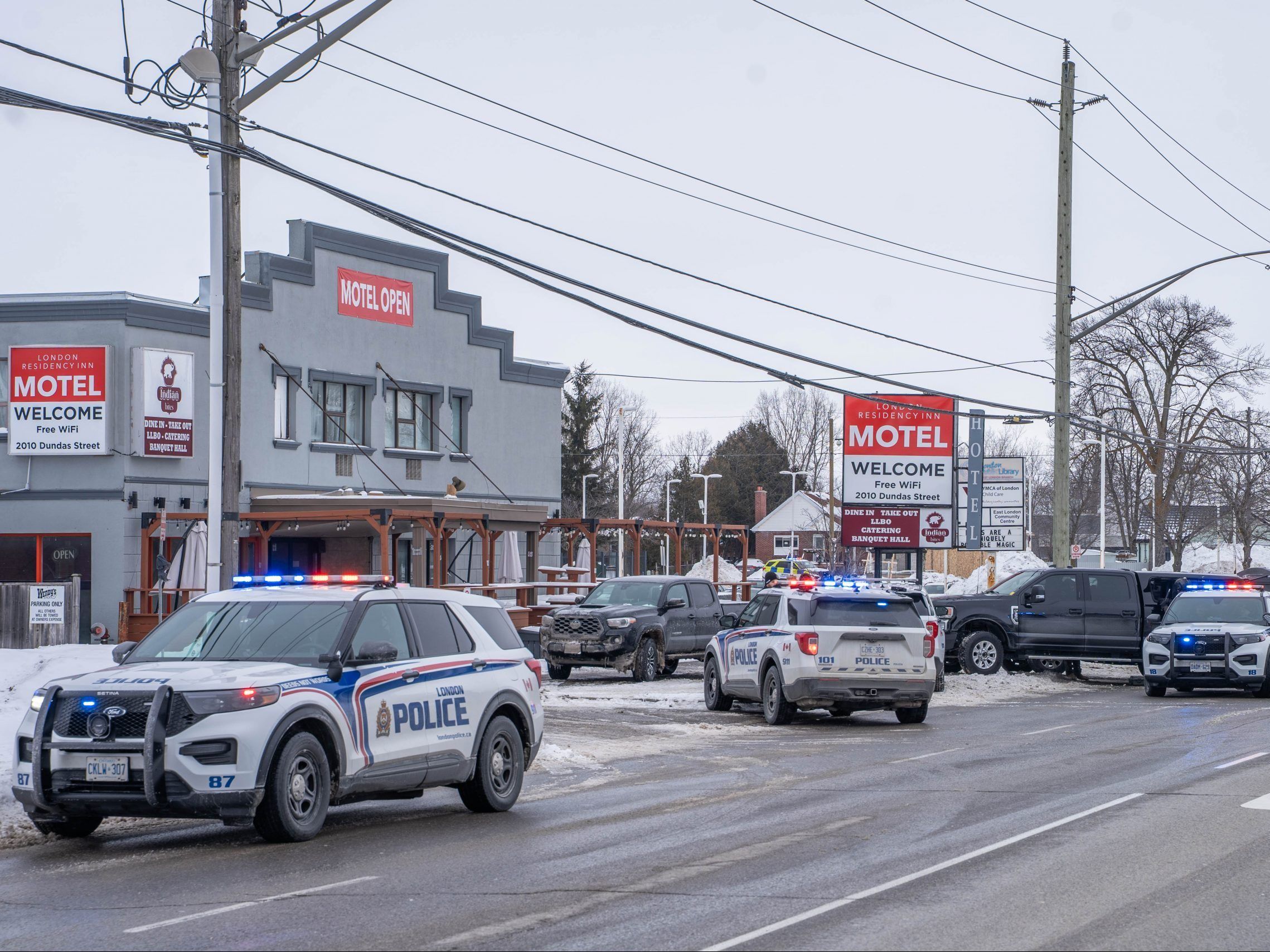 A man is in custody after London police say they arrested a suspect at an east-end motel as part of a weapons investigation.