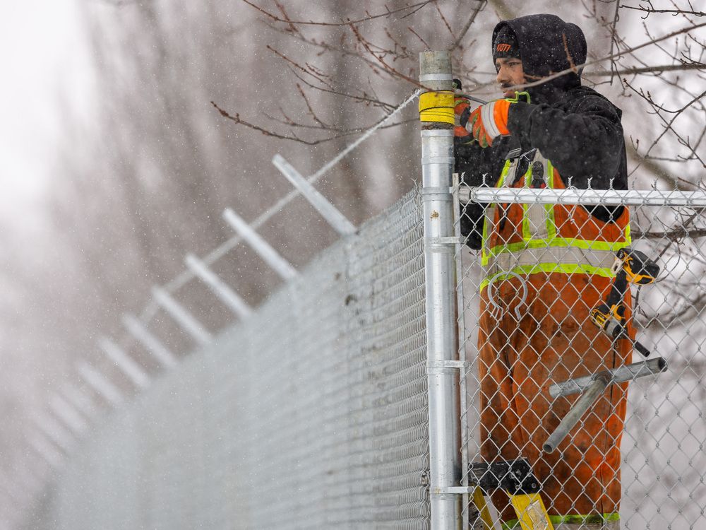 Some businesses near London's new homeless shelter are spending heavily on security measures in response to a city project