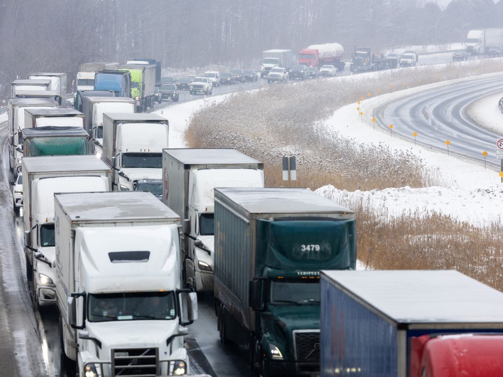 All of Highway 402 was closed Saturday morning, after a winter storm walloped the region