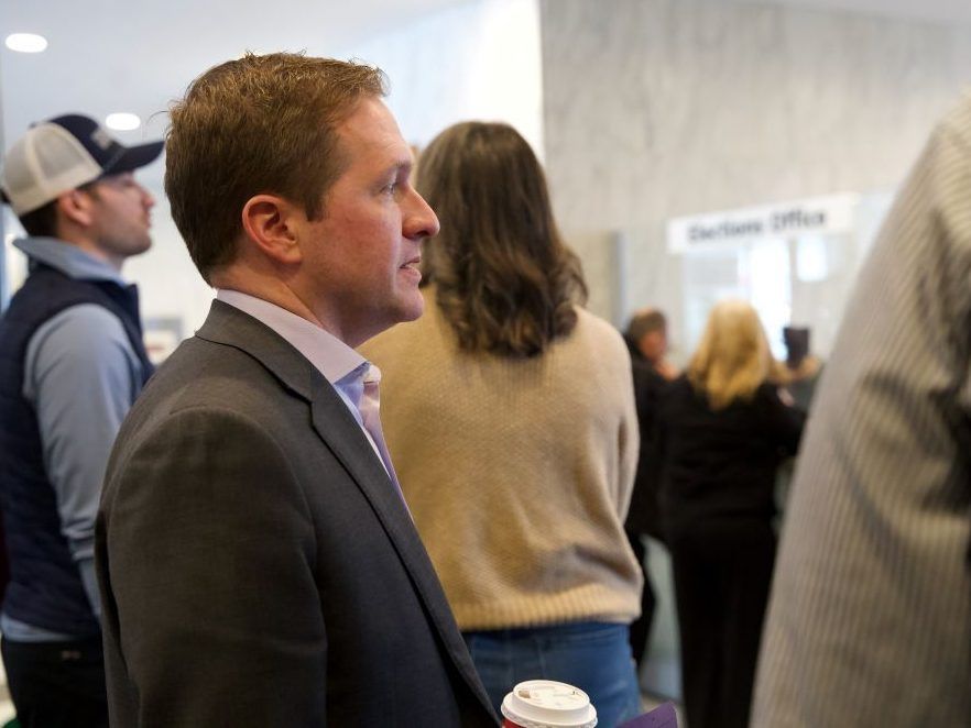 London Mayor Josh Morgan waits in line