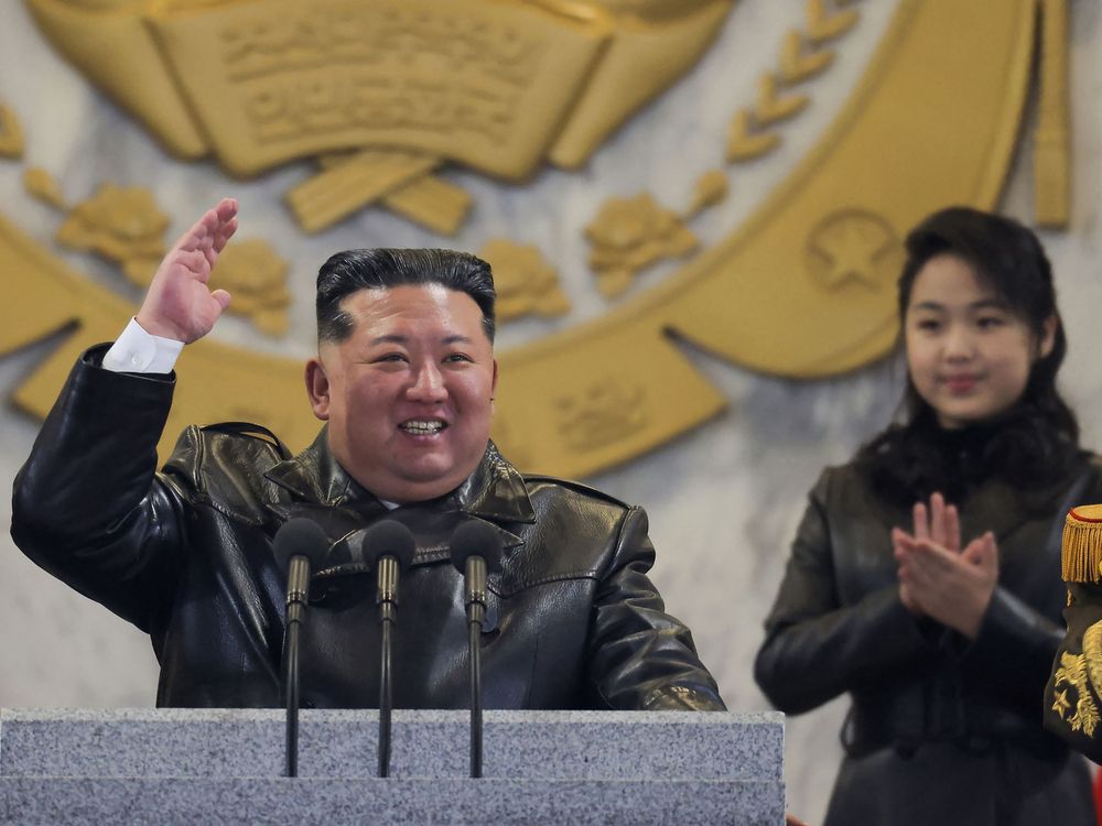 North Korean leader Kim Jong Un (R) and his daughter Kim Ju Ae