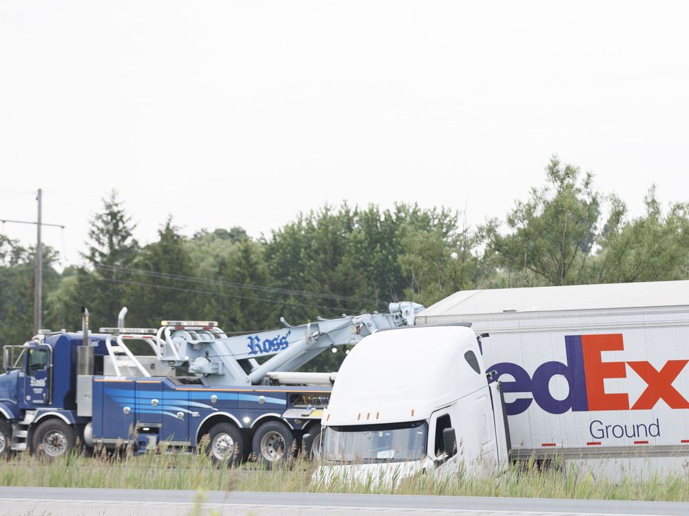 Jackknifed tractor-trailer closes westbound Highway 402 in London