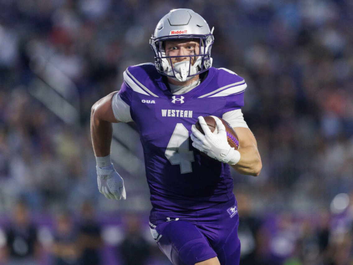 Western Mustangs score 10 touchdowns, romp to 78-7 win in head coach's debut