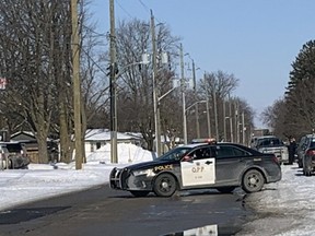Traffic between Waterloo and Rowland Streets along Wellington Street in Mitchell has been closed off for a number of hours while OPP investigate "an ongoing incident" Feb. 9 in the Wellington Terrace apartments (left). There is no threat to public safety, OPP added. ANDY BADER/MITCHELL ADVOCATE