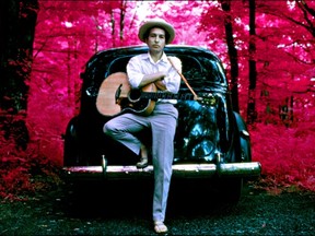 Bob Dylan, outside his Byrdcliffe home, infrared color film, Woodstock, NY, 1968.  Photo By Â¬Â©Elliott Landy, LandyVision Inc.