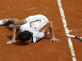 Italy's Francesca Schiavone kisses the c