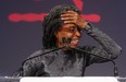 Dionne Brand reacts to being named winner of the 2011 Griffin Poetry Prize for Ossuaries in Toronto' on June 1, 2011. Photo: Peter J. Thompson, National Post