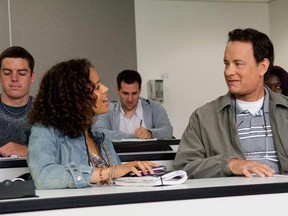 Talia (Gugu Mbatha-Raw) and Larry (Tom Hanks), before she revamps his wardrobe.
Below: Larry (Tom Hanks) and Mercedes (Julia Roberts) after Larry's wardrobe transformation.
Photos courtesy Universal Pictures
