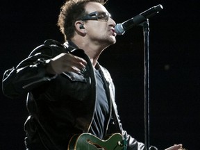 U2 frontman Bono performing in Montreal July 8. Photo by Rogerio Barbosa, AFP/Getty Images