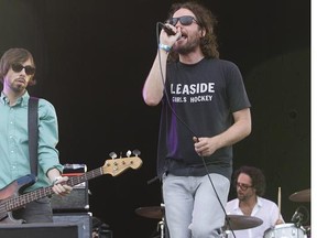 Kevin Drew (R) of Broken Social Scene performs on the first day of the Osheaga music festival at Jean Drapeau Park in Montreal on Friday, July 29, 2011