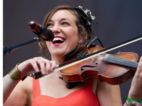 Rosetta!'s violinist Kinley Dowling performs at the Osheaga Music and Arts Festival in Montreal, July 30, 2011