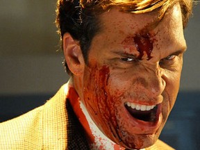 Dane Cook covered in the blood of self-aware 1990s slashers in Detention.