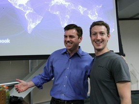 Facebook CEO Mark Zuckerberg (R) and Skype CEO Tony Bates (L) embrace during a news conference at Facebook headquarters July 6, 2011 in Palo Alto, California. Zuckerberg announced new features that are coming to Facebook including video chat and a group chat feature. (Photo by Justin Sullivan/Getty Images)
